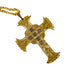 Gold cross pendant with intricate design on a white background